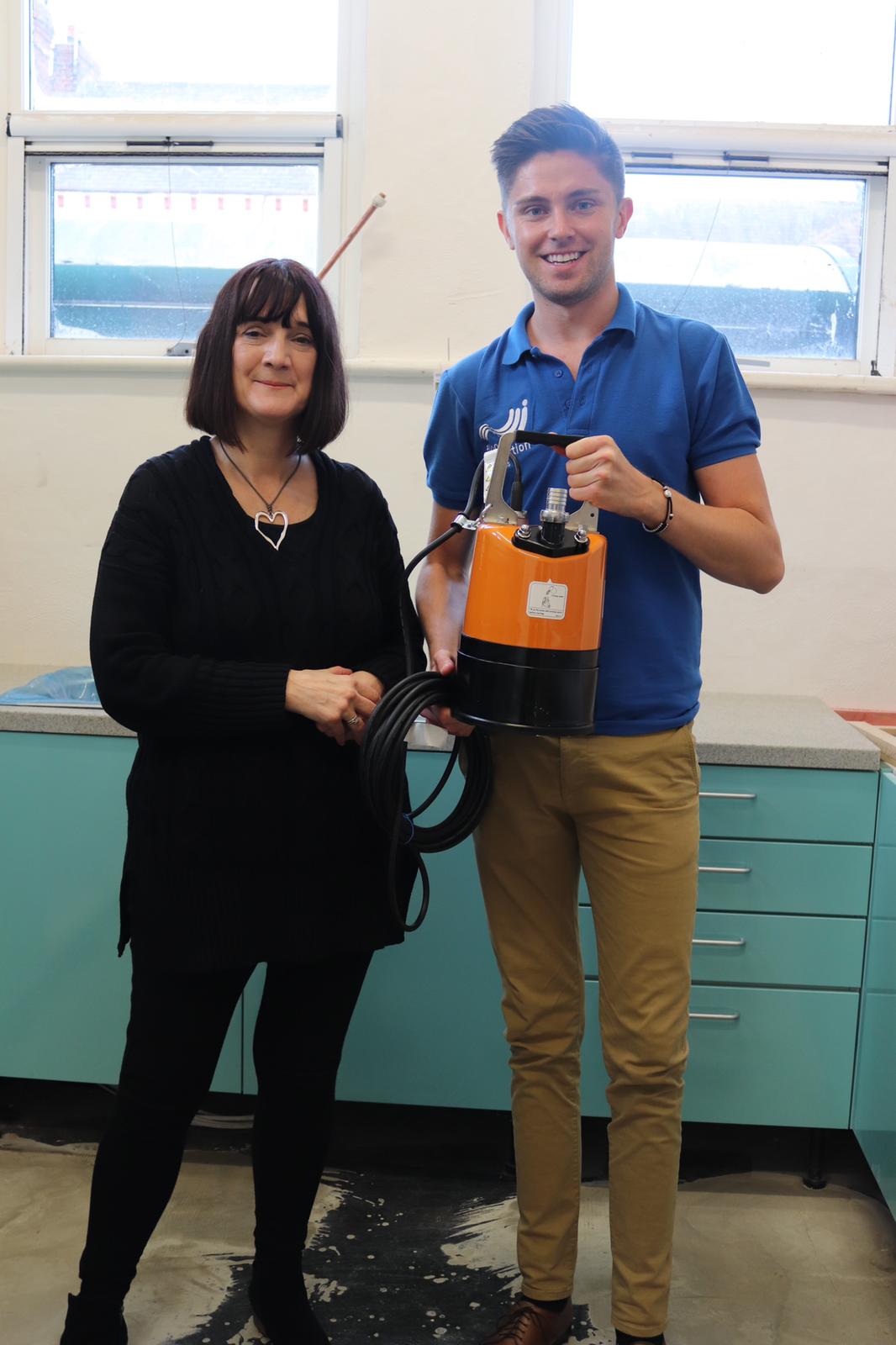 Mary Dhonau OBE and Simon Crowther with Puddle Pump