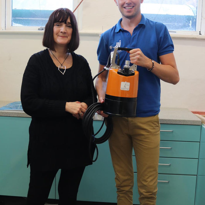 Mary Dhonau OBE and Simon Crowther with Puddle Pump