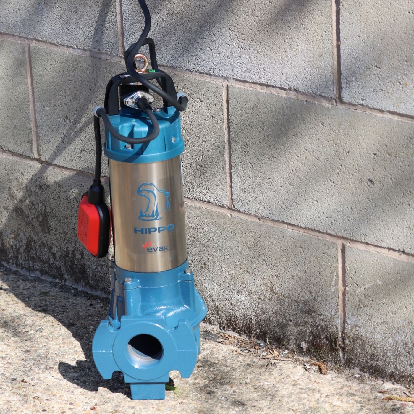Evak Hippo Sump Pump against a wall