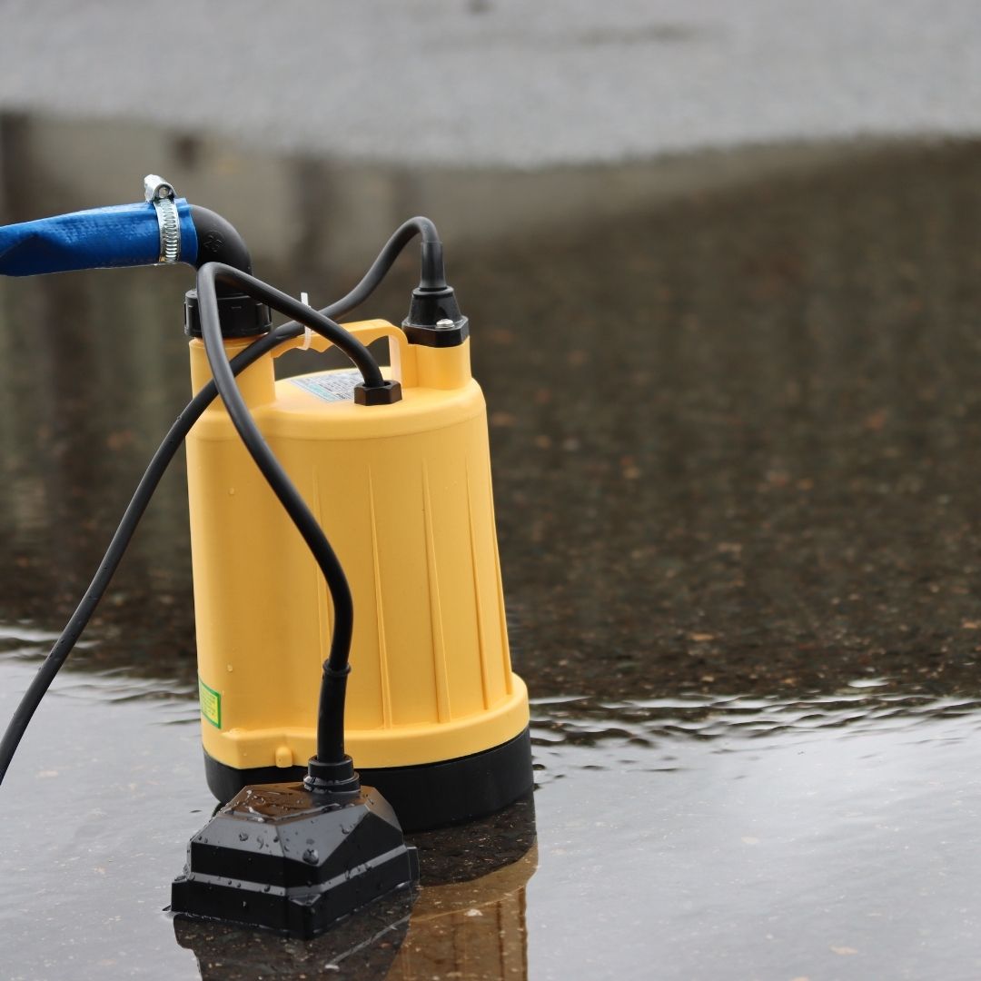 Puddle pump with shallow water on floor