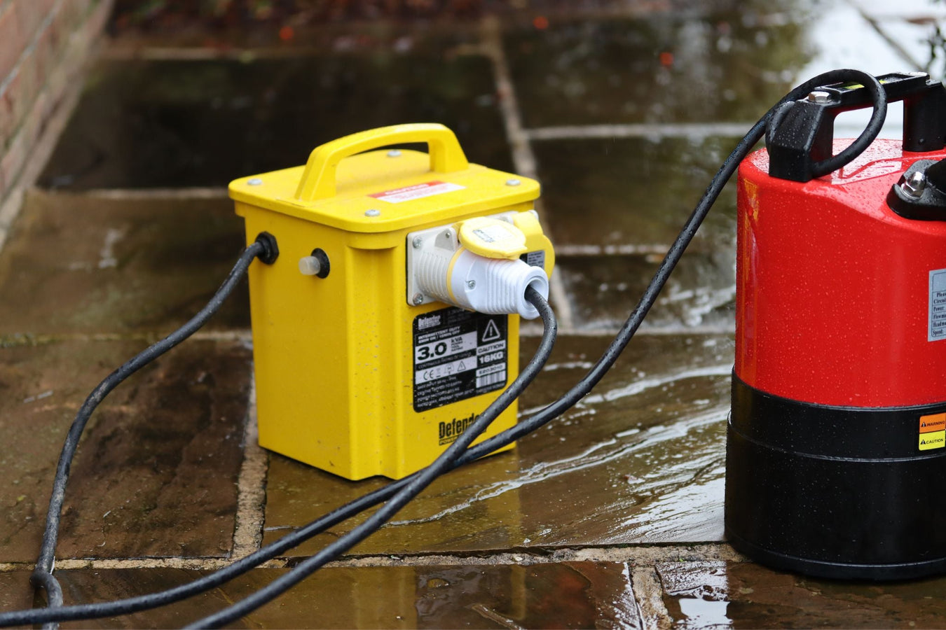 110V Water Pump pictured with yellow site transformer