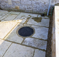 Sump Pump discreetly installed into patio