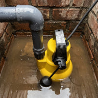 AMA Drainer 301 in brick sump chamber with flood water
