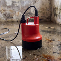 red APP BPS80 manual water pump in damp room with low level water pooling