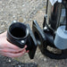 Person shwing vertical fitting on sewage pump
