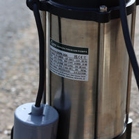 automatic sewage pump with a technical label on a blurred background