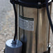 automatic sewage pump with a technical label on a blurred background