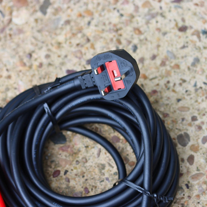 Coiled 230v electrical cable with a plug for a sewage pump