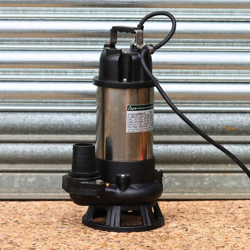 DSPK submersible sewage pump with a 80mm hose tail on a corrugated metal background
