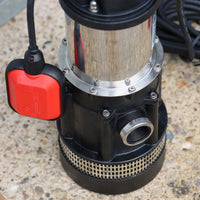 Well Pump with a auto red float switch on a concrete surface