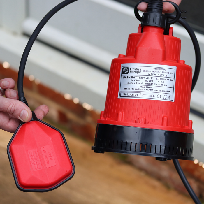 Battery powered water pump with float switch