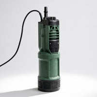 A green and black DAB Divertron pump with a black power cord, standing upright on a light gray studio background.