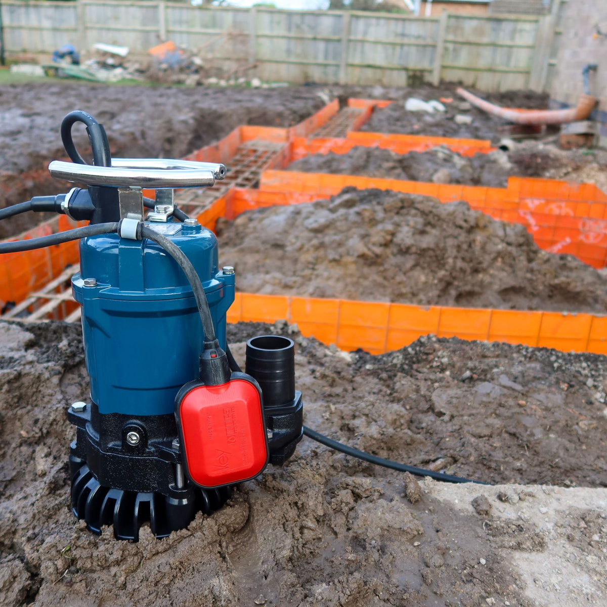 Site dewatering from foundations with EVAK Trenchman pump.