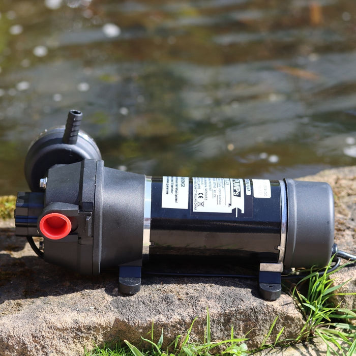 FL Demand water pump next to pond