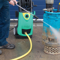 Pressure washer with 19mm yellow high pressure hose connected cleaning a water pump