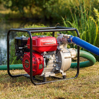Honda water pump on grass with a natural background