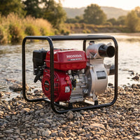 Honda water pump on pebbles with a natural background
