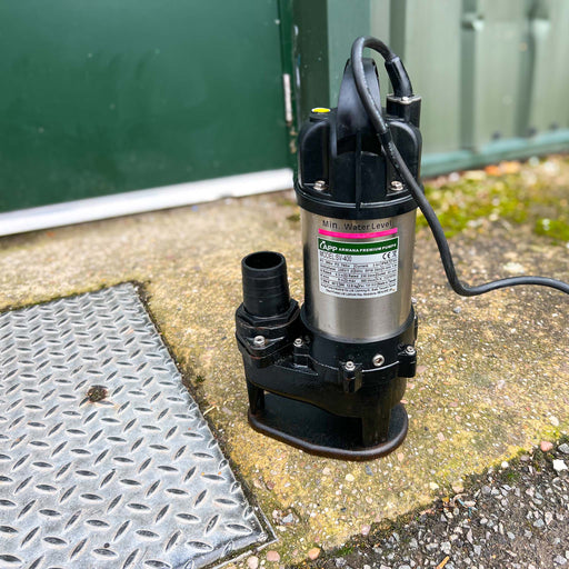 APP SV Sewage Pump placed next to a manhole lid