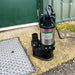 APP SV Sewage Pump placed next to a manhole lid