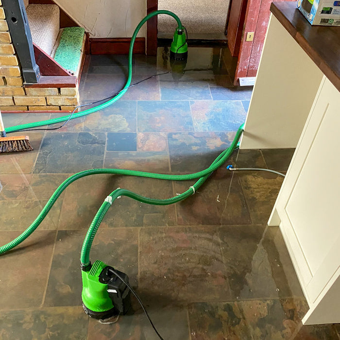 EGO500Gi Puddle Pumps in use in a flooded house