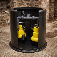 A twin sump chamber pictured in a cellar
