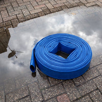 layflat 50mm hose pipe next to puddle 