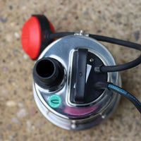 top down shot of mizar submersible water pump with red float switch