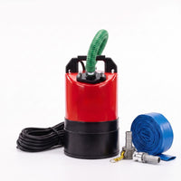 A submersible water puddle pump with  a green flexible hose, a blue hose, and a CAM adapter, shown on a white background.