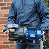 man holding speroni swimming pool pump