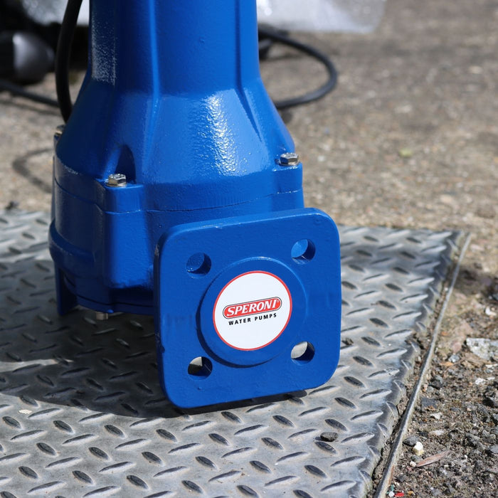Blue SPERONI sticker on sewage water pump on a manhole cover with a blurred background