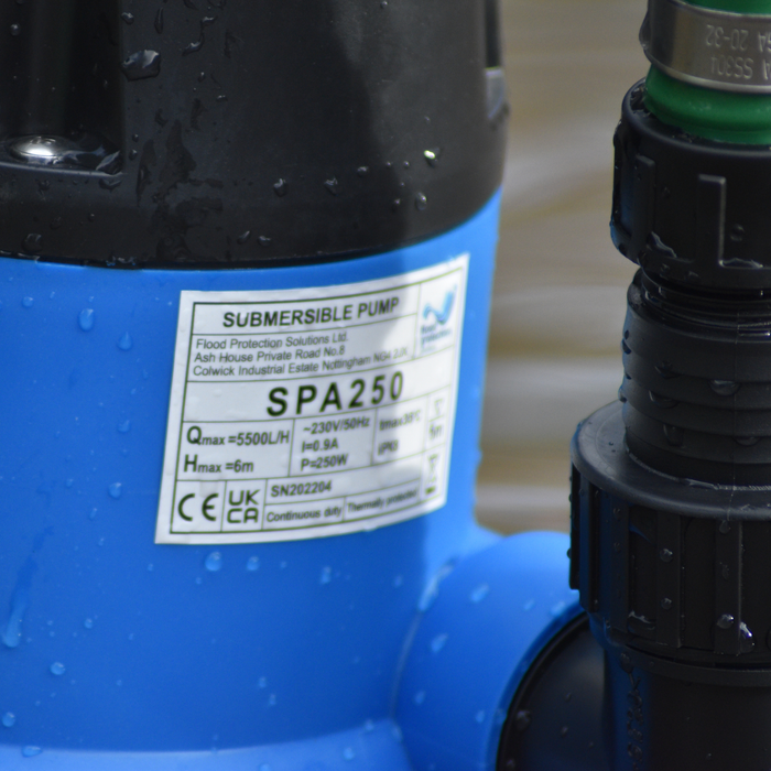 Blue submersible pump with a label showing model number SPA250