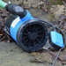 base of automatic submersible water pump on its side.