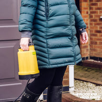 Yellow Stream SPP Puddle Pump pictured with homeowner 