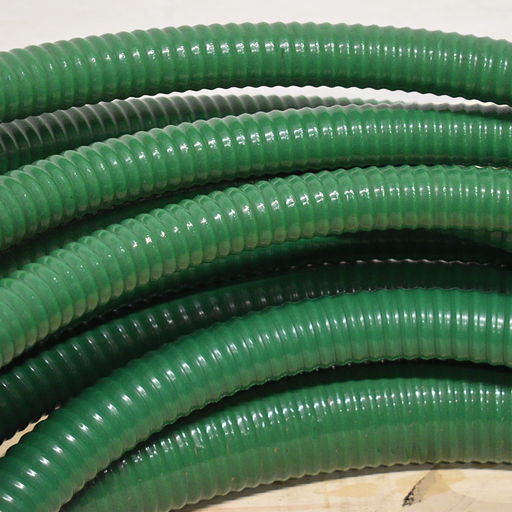 Close up of multiple widths of suction delivery hose 