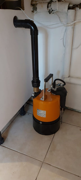 Puddle pump fitted in a kitchen with sensor extension probes to be automatic