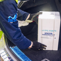 Stream SPK530 Puddle Pump being loaded into a car, compact and portable water pump for quick dewatering