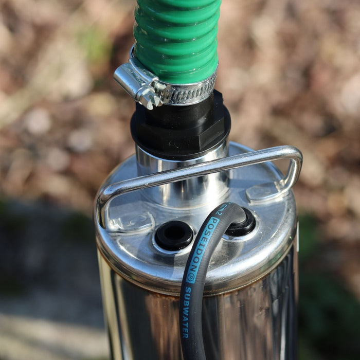Acuasub well borehole water pump connected to green suction delivery hose