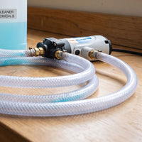 13mm clear braided hose pipe being used in chemical transfer