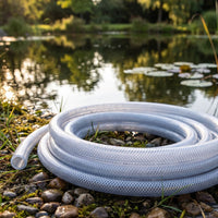 clear braided 20mm hose pipe next to pond