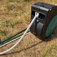 A flexible 13mm braided suction hose made of reinforced clear PVC and a hose reel 
