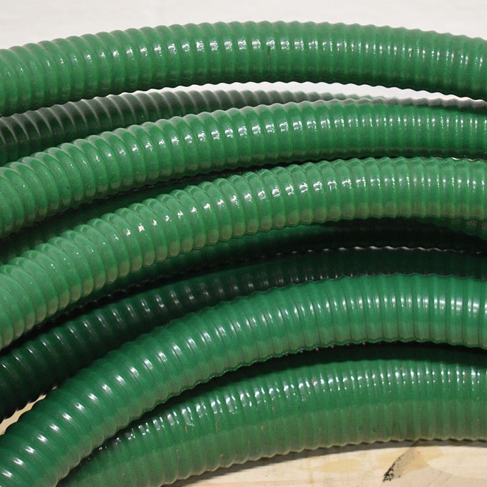 Close up of multiple widths of suction delivery hose 