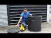 Man shows sump pump in use
