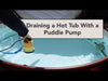 Draining a hot tub with a puddle pump